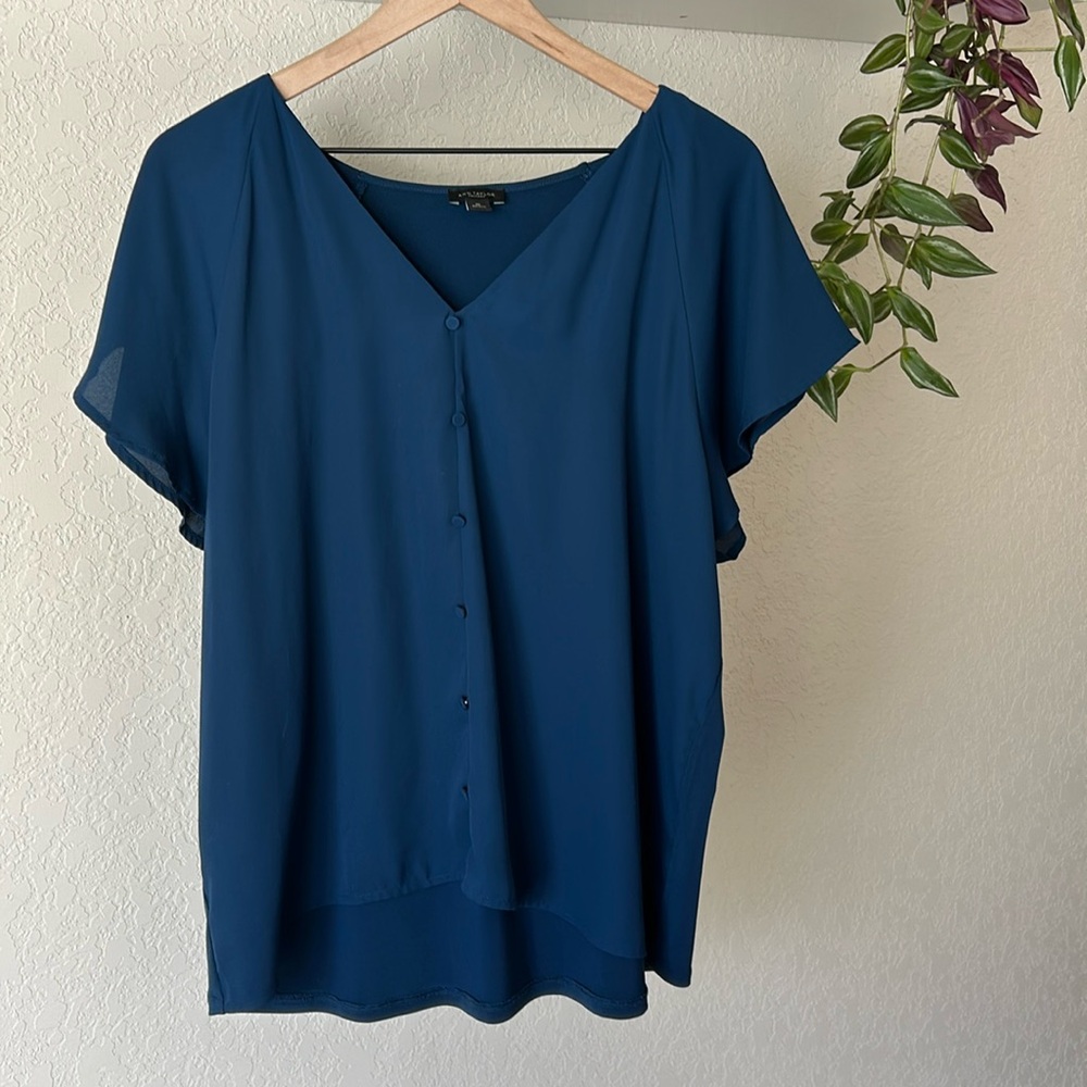 Classy navy cap sleeve shirt by Ann Taylor with cute buttons.